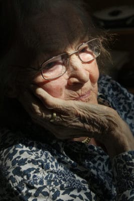 Refection of an older woman 